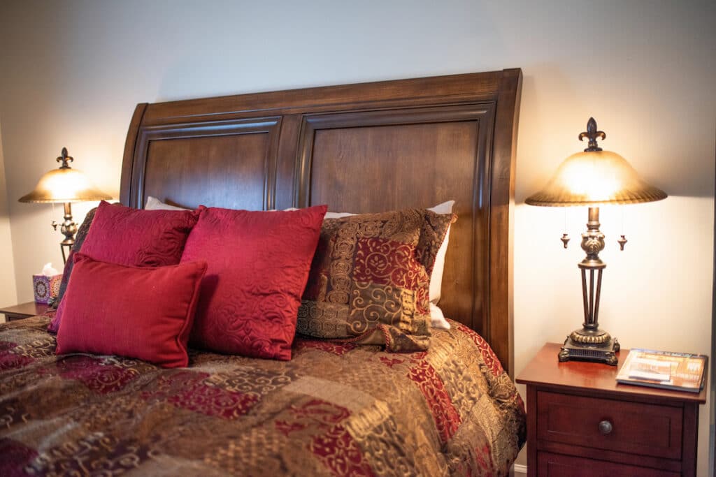 best Bed and Breakfast in Atlanta, warm guest room with soft light and luxurious bedding